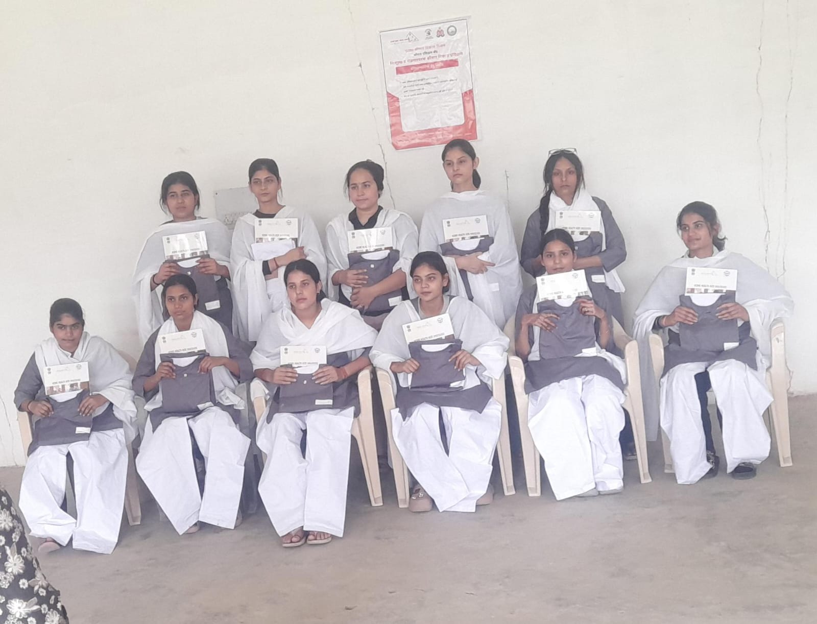 Young women receiving skill-training certificates